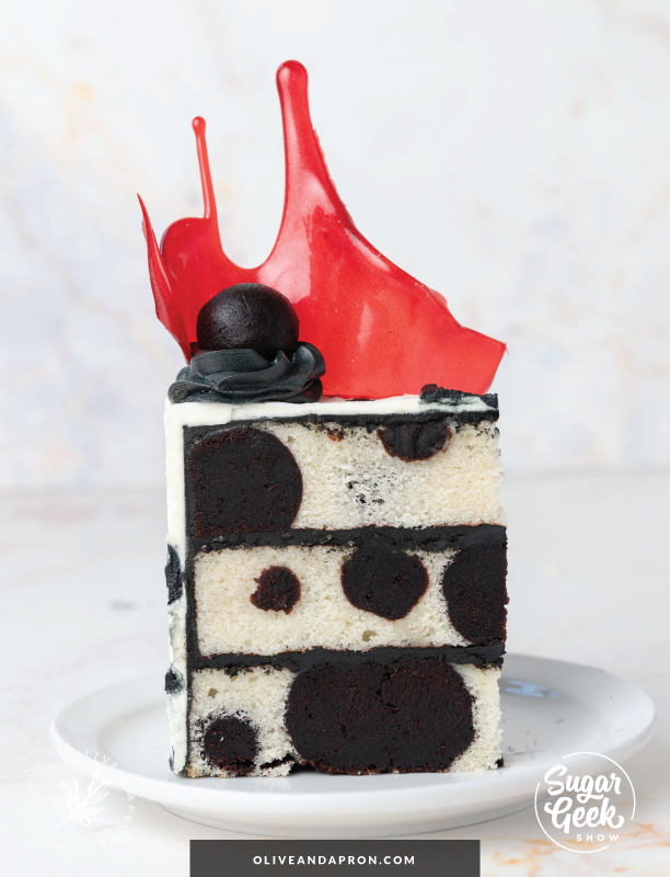 Polka dot vanilla and chocolate cake! The perfect Cruella center by Sugar Geek Show.