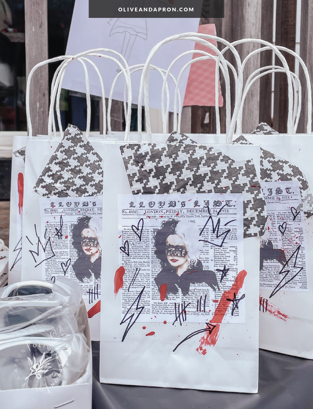 DIY Party favor bags with custom Cruella movie details.